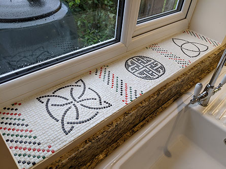Roman style tiling for a kitchen window sill